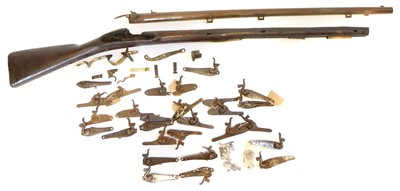 Lot 233 - Major parts of a musket and a collection of locks.