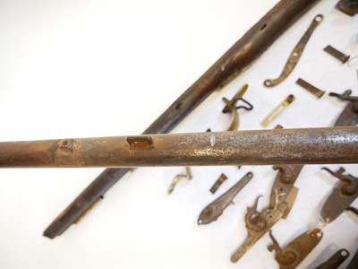 Lot 233 - Major parts of a musket and a collection of locks.