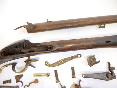 Lot 233 - Major parts of a musket and a collection of locks.