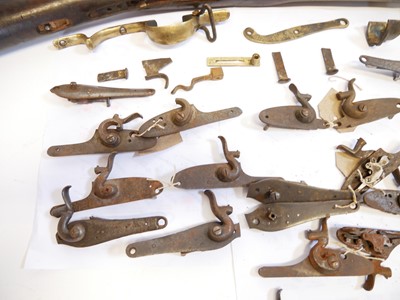 Lot 233 - Major parts of a musket and a collection of locks.
