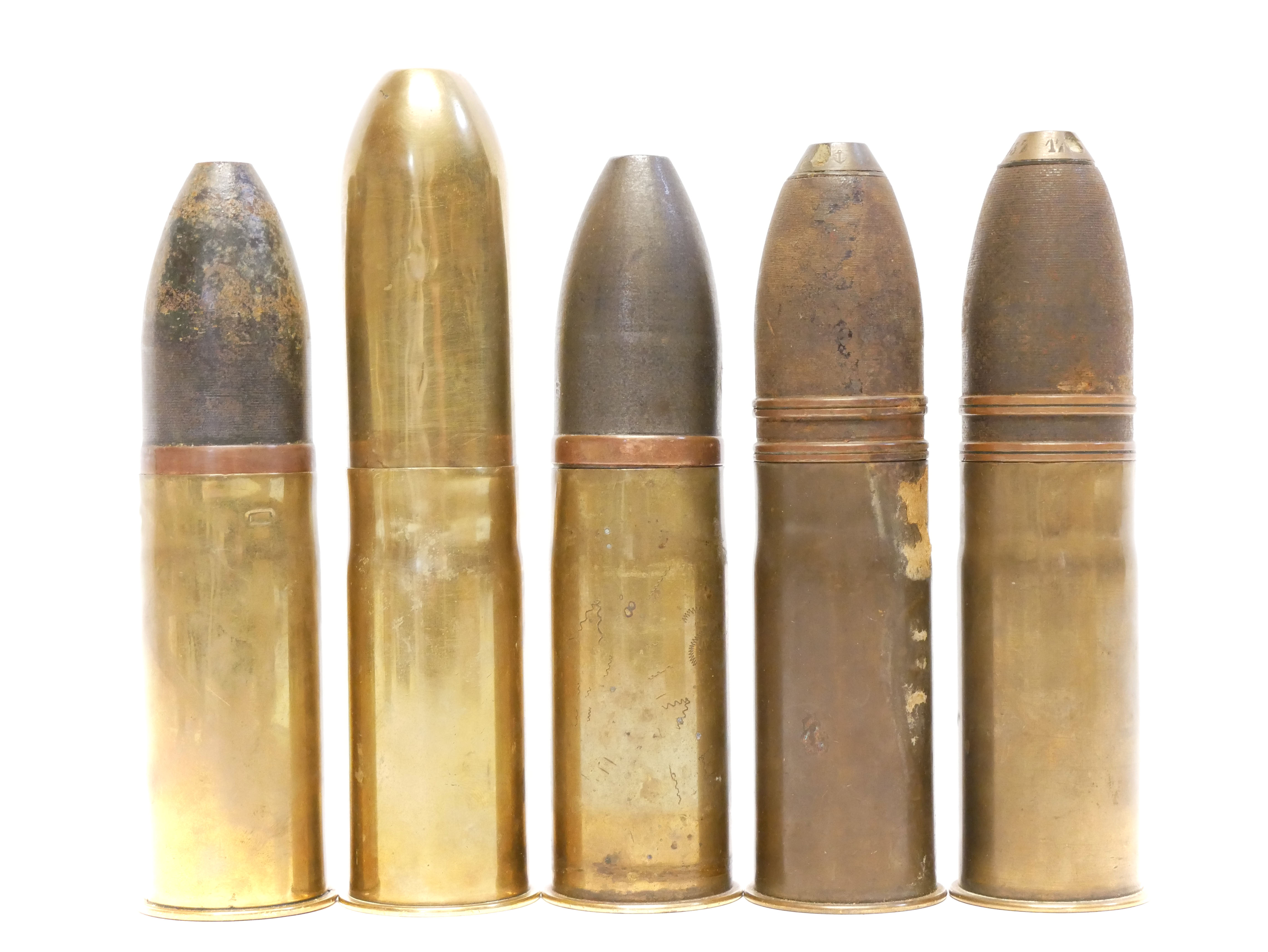 Lot 321 - Five 37mm WWI rounds.