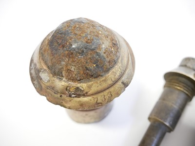 Lot 325 - Six WWI French fuses and one German fuse