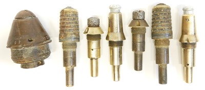 Lot 326 - Six WWI French fuses and one British example.