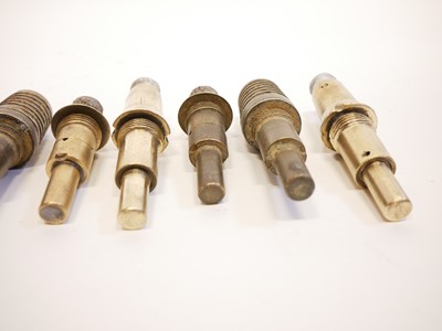 Lot 326 - Six WWI French fuses and one British example.