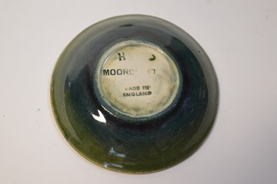Lot 129 - Moorcroft Cup & Saucer and Pin Dish