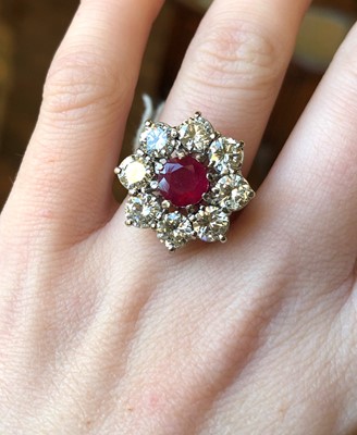 Lot 125 - An 18ct gold ruby and diamond cluster ring