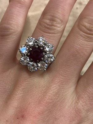 Lot 125 - An 18ct gold ruby and diamond cluster ring