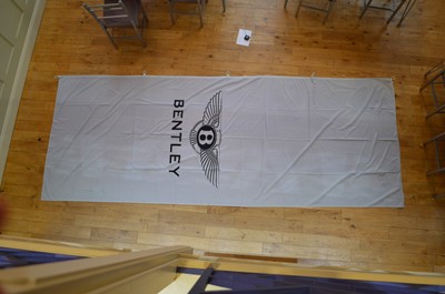 Lot 173 - Two Bentley Flags, large advertising banner and a length of Rolls Royce fabric