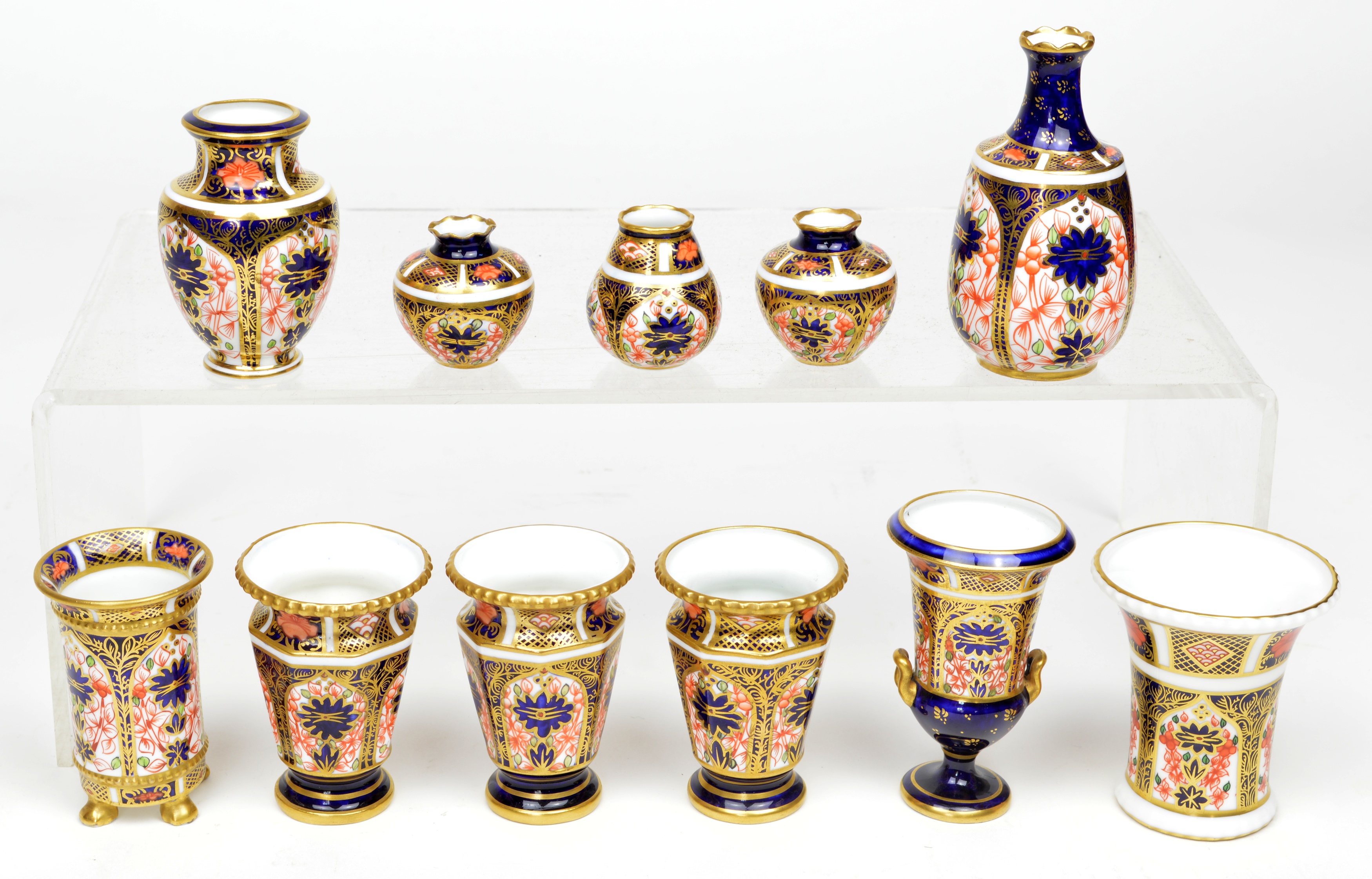 Lot 117 - 11 items of miniature Royal Crown Derby