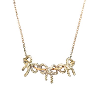 Lot 57 - A Tiffany & Co. silver and gold 'Triple Bow' necklace