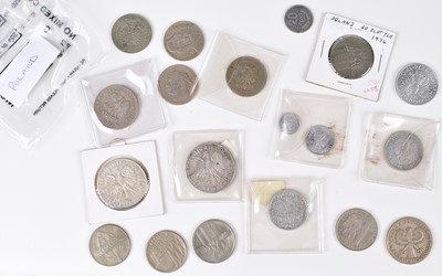 Lot 55 - Tin of assorted foreign coinage to include many silver coins from Netherlands etc.