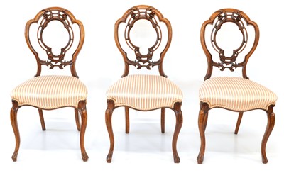Lot 350 - Three Victorian walnut framed single dining chairs