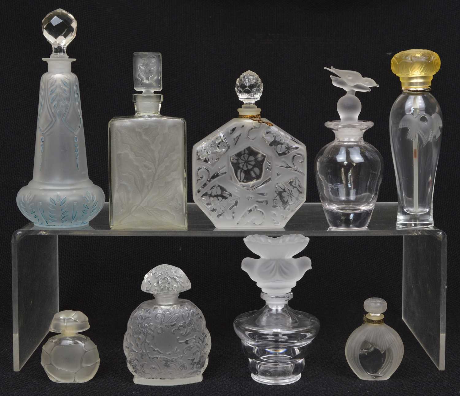 Lot 153 - 9 frosted glass perfume bottles