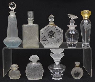 Lot 153 - 9 frosted glass perfume bottles