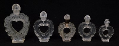 Lot 166 - 5 Lalique Nina Ricci 'Coeur Joie' heart shaped perfume bottles