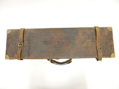 Lot 220 - Leather and brass shotgun case