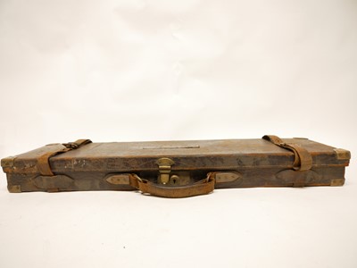 Lot 220 - Leather and brass shotgun case