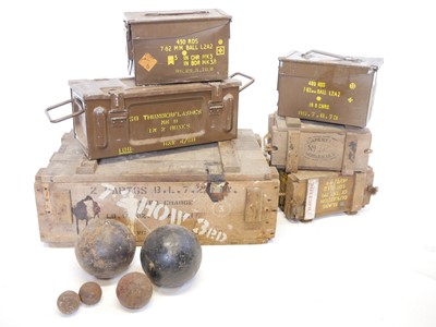 Lot 306 - Cannon balls and ammunition cases
