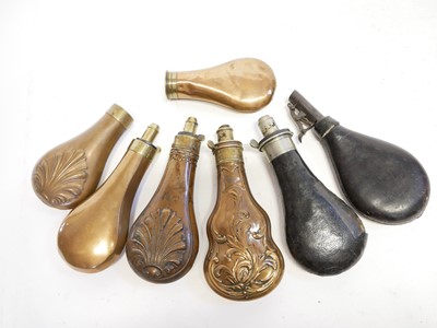 Lot 201 - Four powder flasks, a shot flask and two powder flask bodies