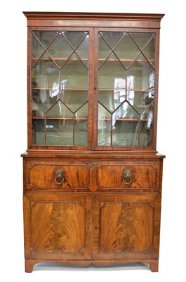 Lot 277 - George III mahogany glazed bookcase on cupboard
