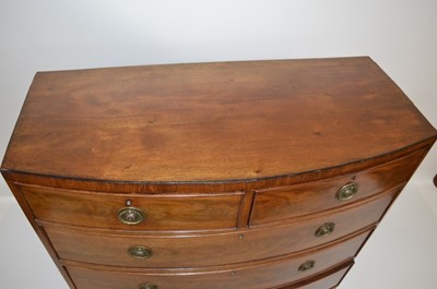 Lot 327 - George III mahogany bow-front chest of drawers