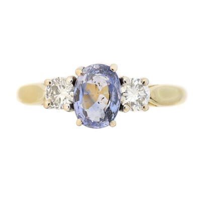 Lot 108 - An 18ct gold sapphire and diamond three stone ring