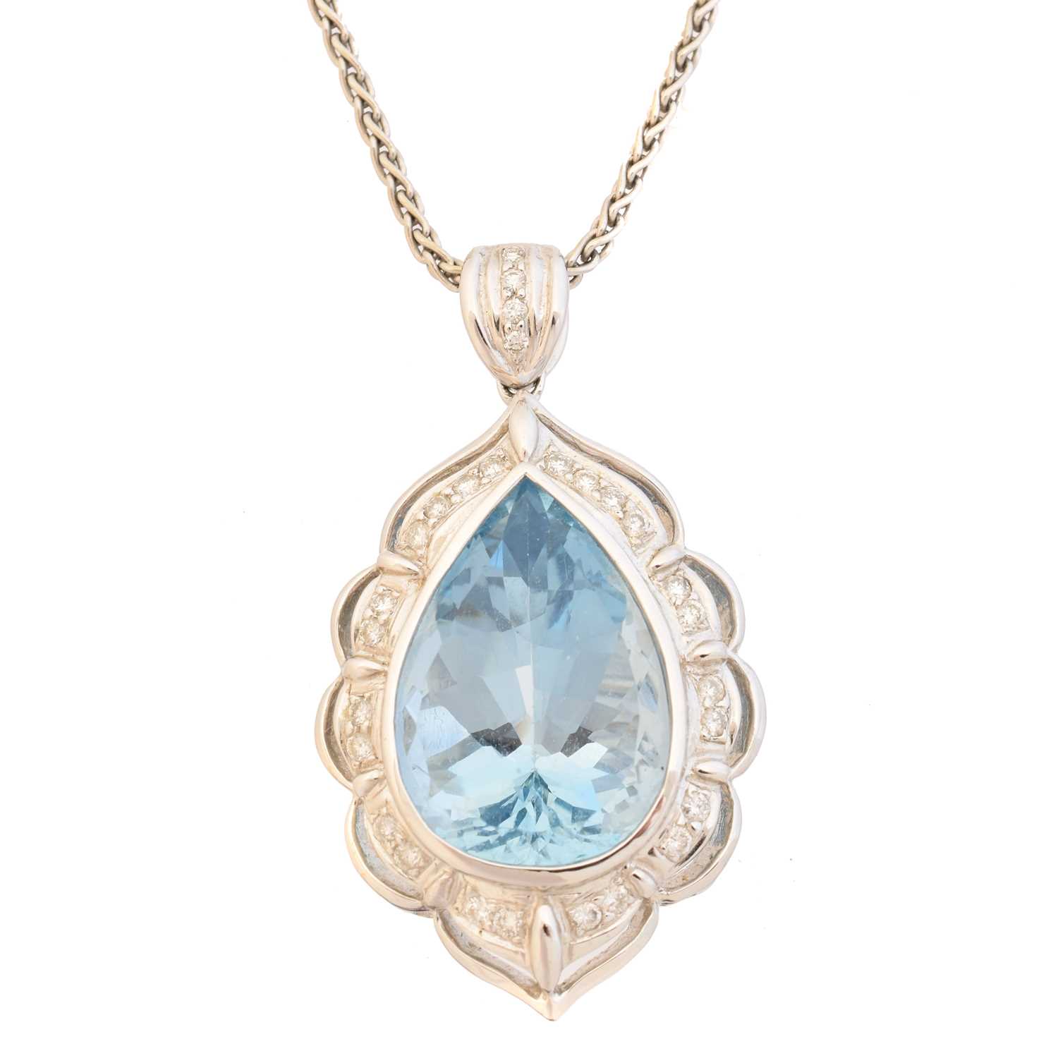 Lot 67 - An 18ct gold aquamarine and diamond pendant