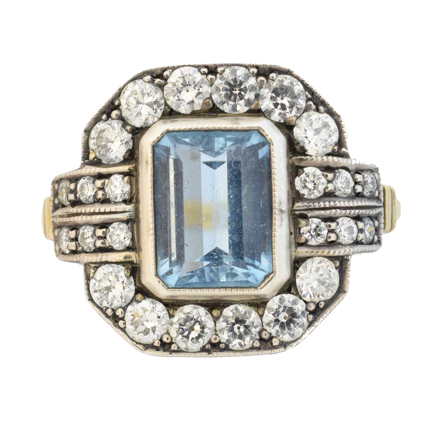 Lot 87 - An aquamarine and diamond dress ring