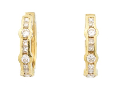 Lot 33 - A pair of 18ct gold diamond hoop earrings