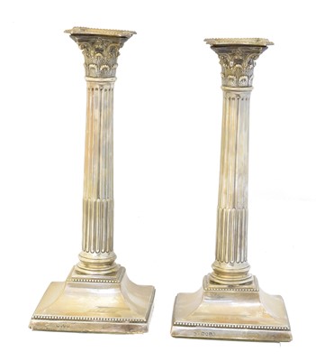 Lot 141 - A pair of Victorian silver candlesticks