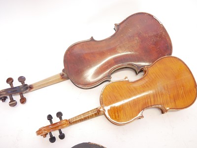 Lot 225 - 4/4 violin and a 1/2 size violin, each with a bow and case.