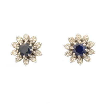 Lot 28 - A pair of sapphire and diamond earrings