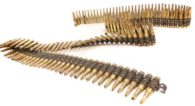 Lot 189 - Two metres of fired GPMG 7.62 blanks on belt clips.