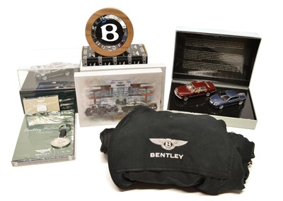 Lot 153 - Bentley collectables to include a jacket and presentation wheel centre hub