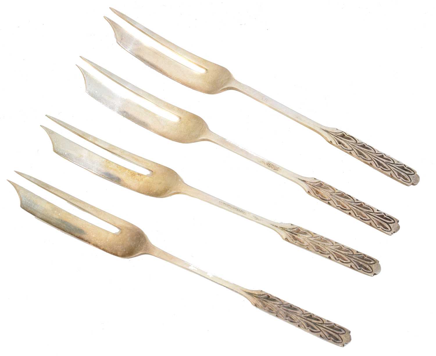 Lot 161 - Four silver hors d'oeuvres forks by Liberty & Co.