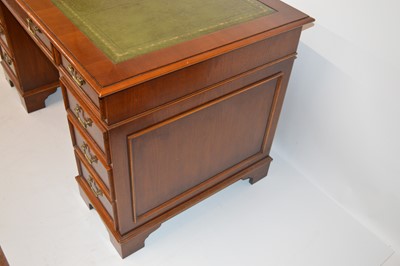 Lot 246 - Late 20th-century mahogany twin pedestal writing desk
