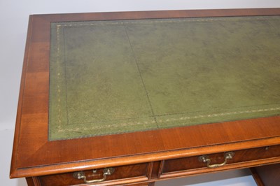 Lot 246 - Late 20th-century mahogany twin pedestal writing desk