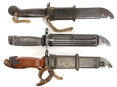 Lot 337 - Three variants of AKM bayonets and scabbards