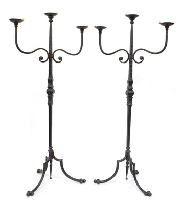 Lot 232 - Pair of early 20th-century wrought metal candle stands