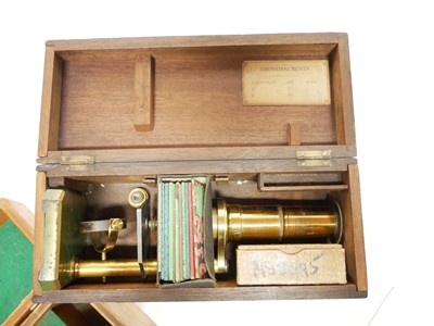 Lot 236 - Cased microscope and slides and a marine distance meter