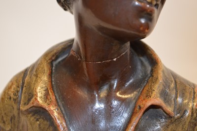 Lot 108 - Painted terracotta figure of a black child