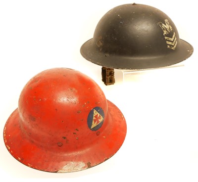 Lot 372 - Two WWII era helmets