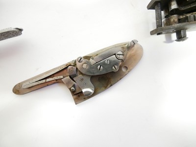 Lot 239 - Collection of gun locks and butt plates.