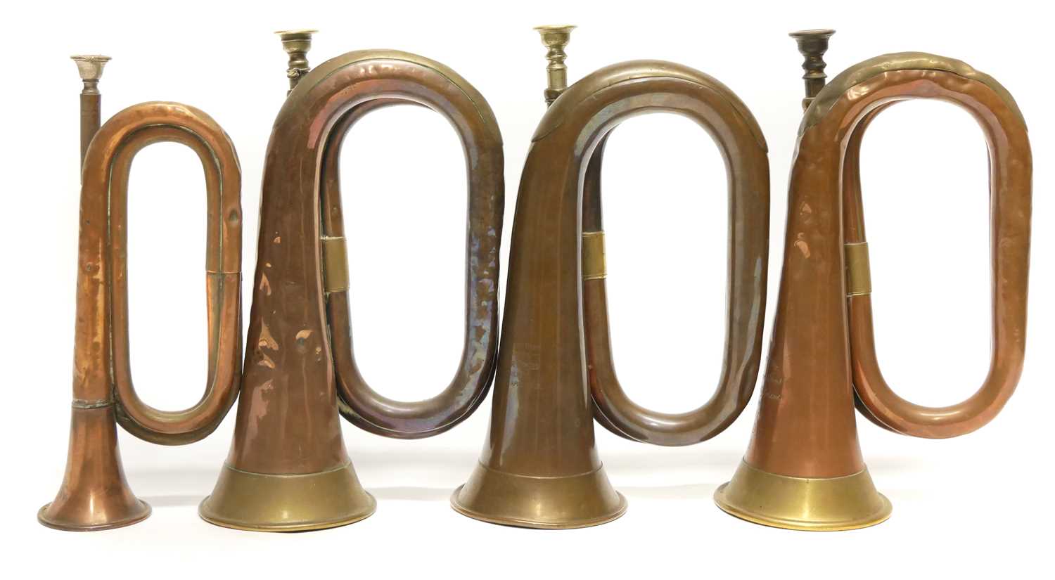 Lesser Bugle Lot 389 - Four bugles, one with Lancashire Fusiliers