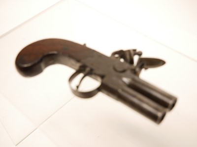 Lot 2 - Flintlock over and under pocket pistol by Spencer of London.