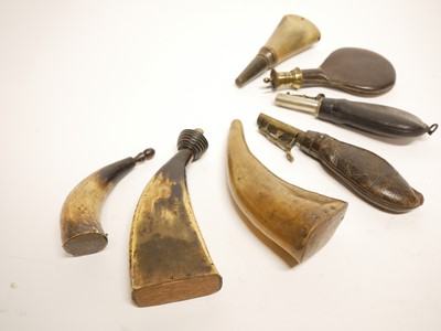 Lot 208 - Four horn powder flasks and three leather shot flasks