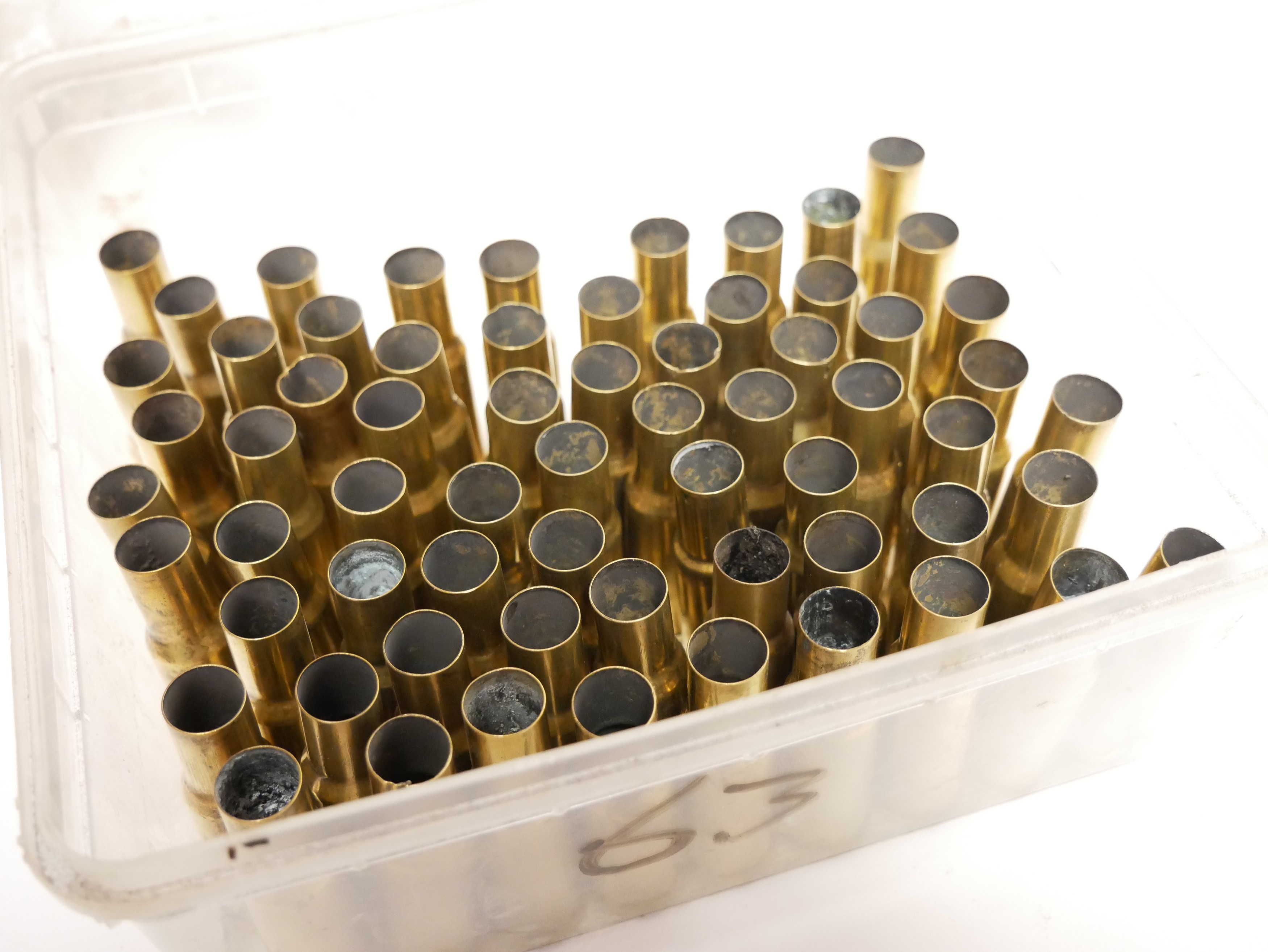 Lot 221 Sixty four .577/450 Martini Henry brass