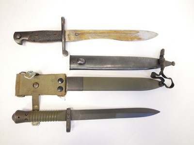Lot 298 - Two Spanish bayonets and scabbards