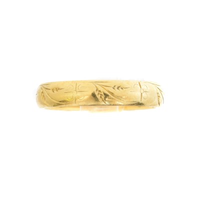 Lot 35 - An 18ct gold band ring