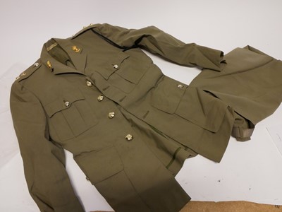 Lot 260 - Eight Australian Army uniform sets and spare buttons
